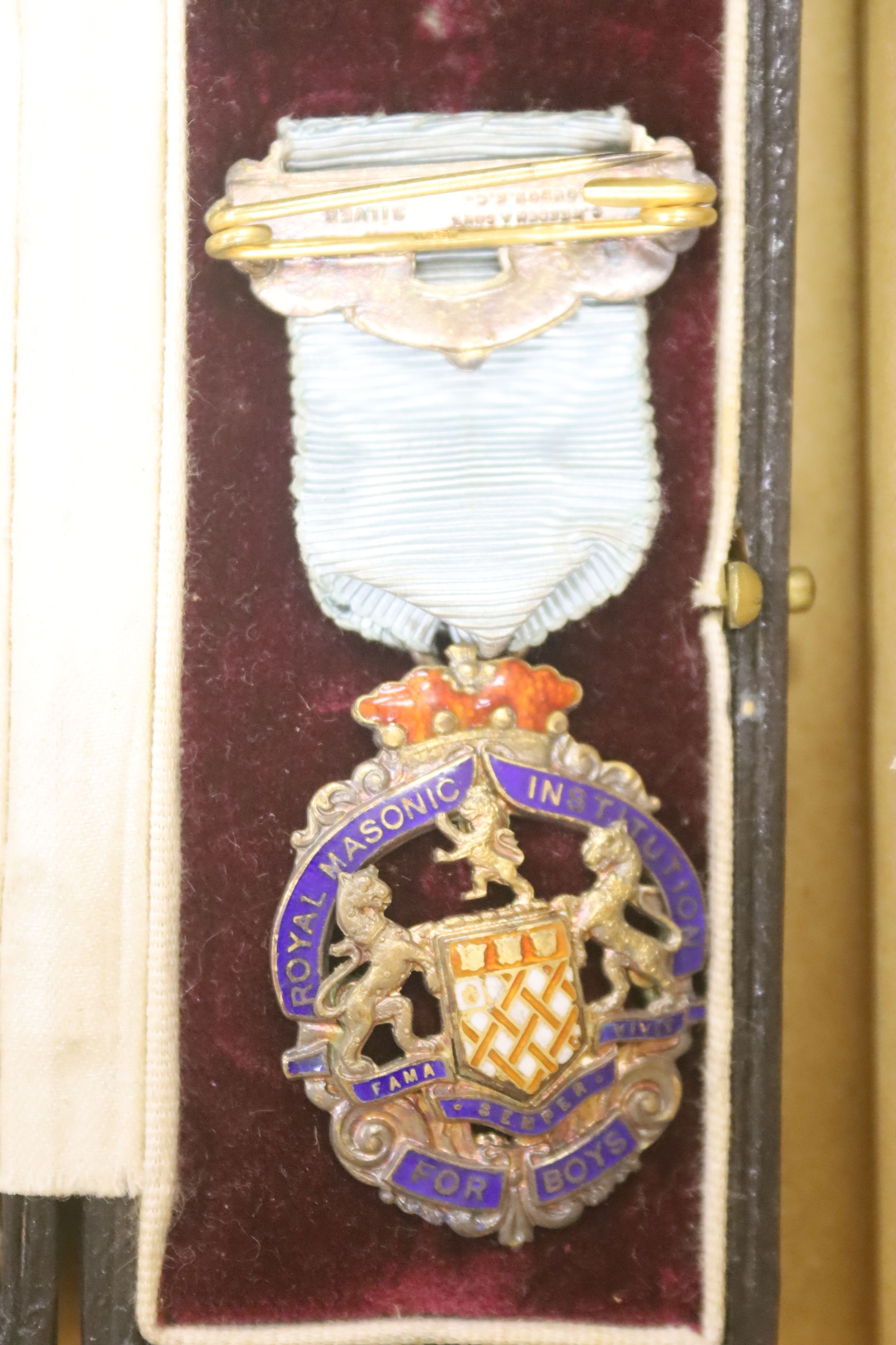 Twenty two silver gilt and enamelled Masonic medallions